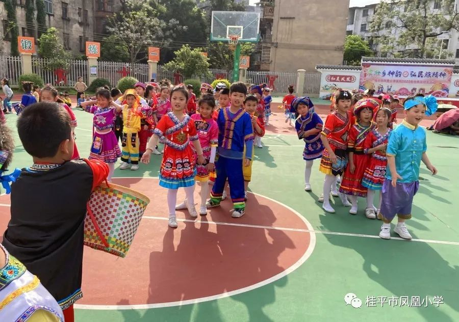 展壮乡神韵扬民族精神桂平市凤凰小学开展壮族三月三系列活动